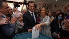 الأسد وعقيلته السيدة أسماء يدليان بصوتيهما في الإنتخابات الرئاسية في مدينة دوما بريف دمشق