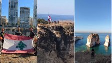 بالصور/ عناصر الدفاع المدني يعيدون رفع العلم اللبناني فوق صخرة الروشة