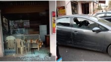 بالصور/ تفلت على مدّ عينك... مجهولون ألقوا قنبلتين في عين الرمانة فجراً مما تسبب بأضرار في المحلات التجارية والسيارات المركونة!