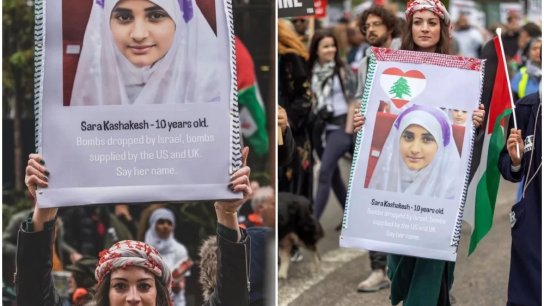 بالصور/ متظاهرة في لندن ترفع صورة الطفلة الشهـيدة سارة قشاقش خلال تظاهرة دعماً لغزة