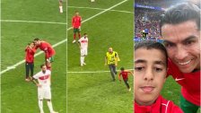 بالفيديو/ مشجع صغير يقتحم الملعب ليسرق سيلفي مع رونالدو ويراوغ الأمن ببراعة!