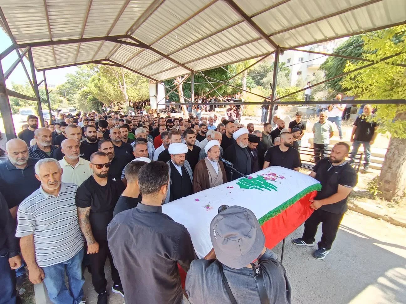 Video / Arab Salim bids farewell to its martyr bride Saja Sharara and escorts her with flowers to her final resting place